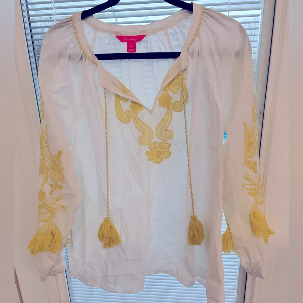 Lily Pulitzer white long sleeve shirt with yellow embroidered accent.